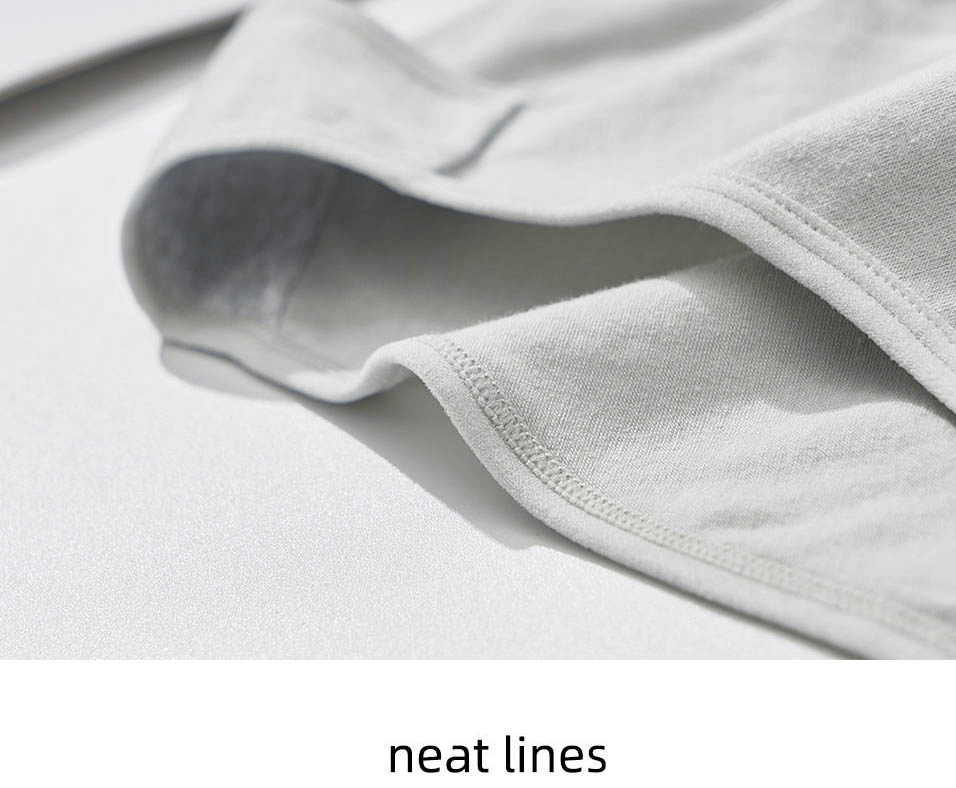 Close-up of soft gray cotton briefs showcasing neat seams and elastic waistband for women's comfort.