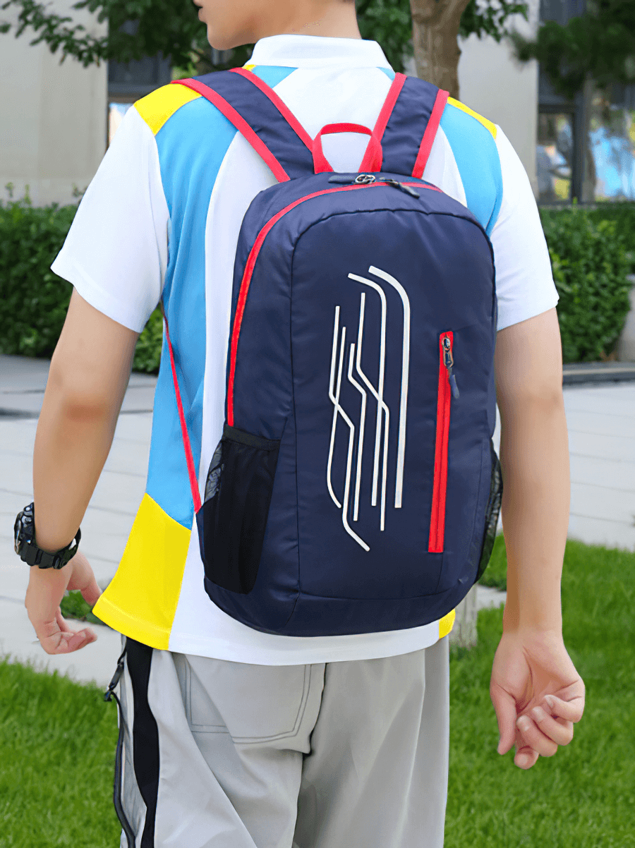 Cyclist wearing 22L Portable Folding Ultralight Backpack in blue, perfect for biking adventures, lightweight and water-repellent.