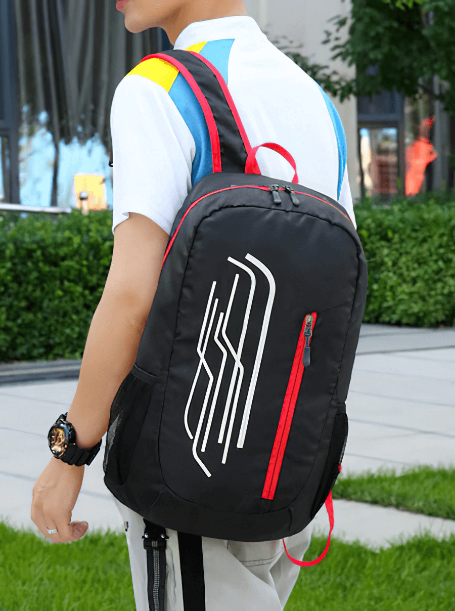 Cyclist wearing a black 22L ultralight folding backpack with white and red accents, perfect for cycling adventures.