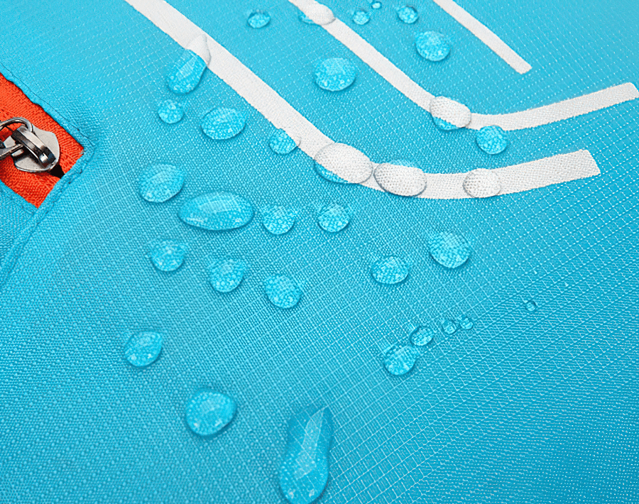 Close-up of water-repellent fabric on blue ultralight cycling backpack, showcasing durable and weather-resistant material