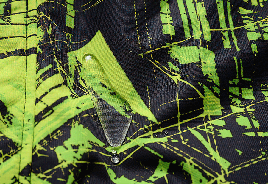 Close-up of Minus 30 Warm Colorful Men's Jacket showcasing waterproof fabric with a modern green pattern, perfect for snowboarding adventures.