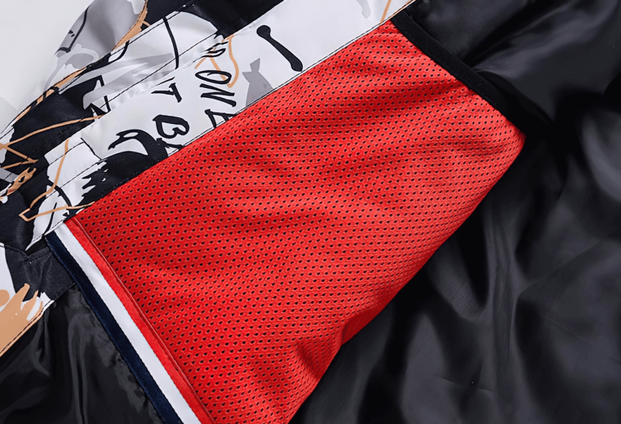 Close-up view of Minus 30 waterproof snowboarding jacket with colorful design and breathable fabric.