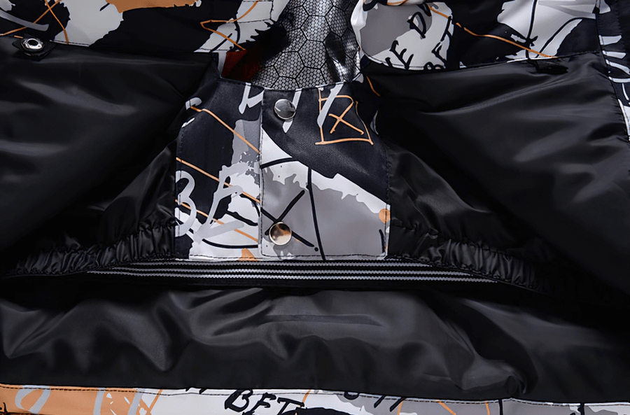 Detailed view of Minus 30 colorful men's jacket showing waterproof, windproof fabric and unique design - perfect for snowboarding.