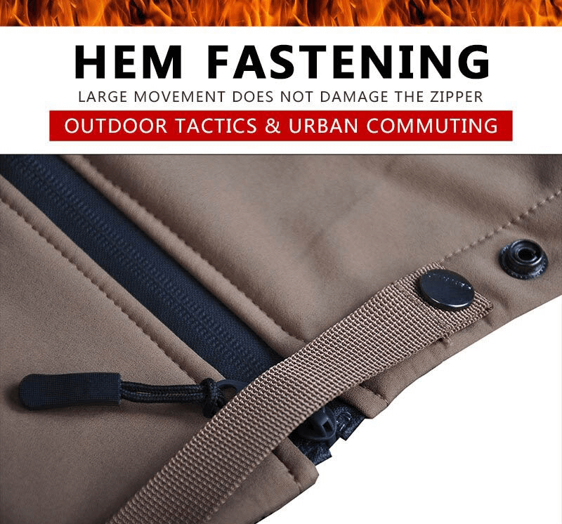 Close-up of hem fastening on windproof softshell hiking jacket with zipper detailing.