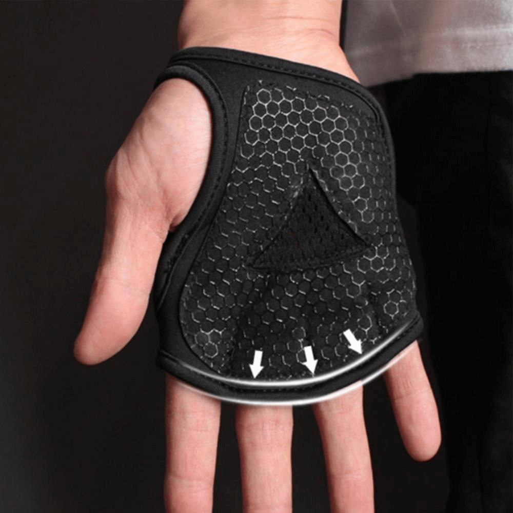 Close-up of a black anti-skid exercise glove on a person's hand, featuring a breathable, honeycomb design for outdoor sports