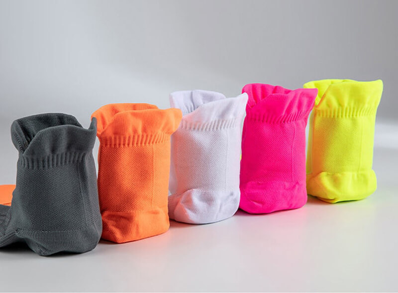 Colorful unisex sport socks for fitness, showcasing anti-sweat technology. Perfect for running and active lifestyles.
