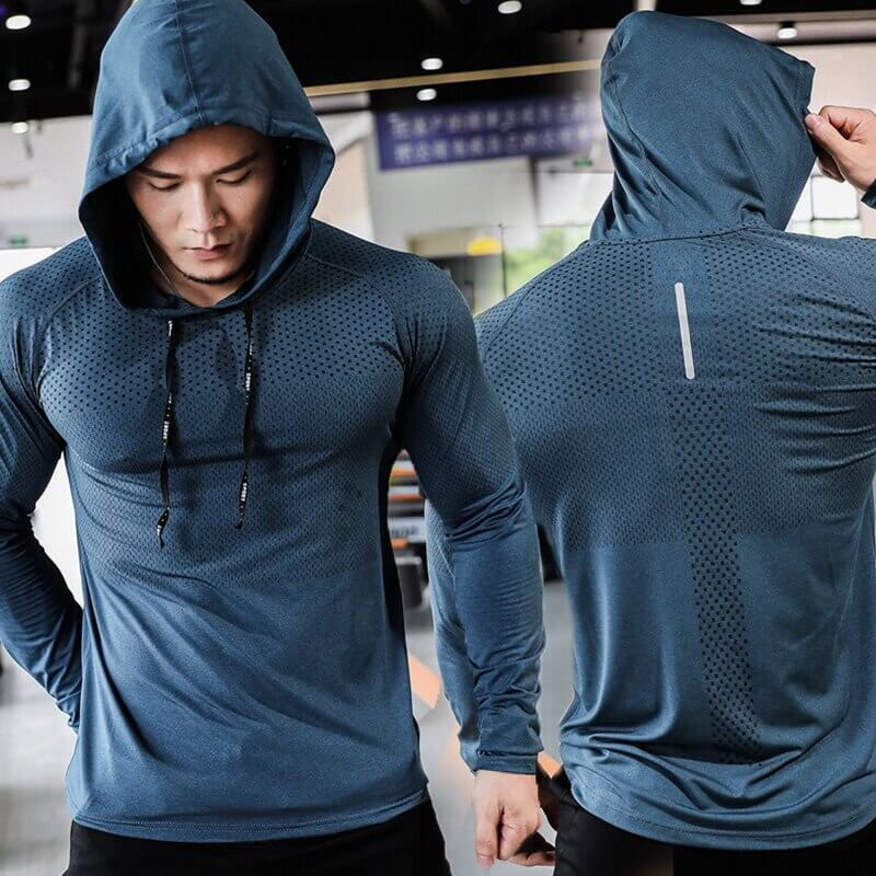 Athletic men's hooded sweatshirt in polyester, perfect for workouts. Features a front and back view in a gym setting.