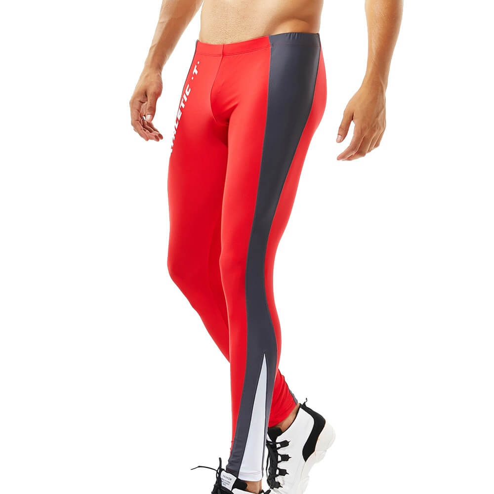 Athletic men's red and black skinny tights for workouts, featuring a mid-waist and elastic fit for gym or casual wear.