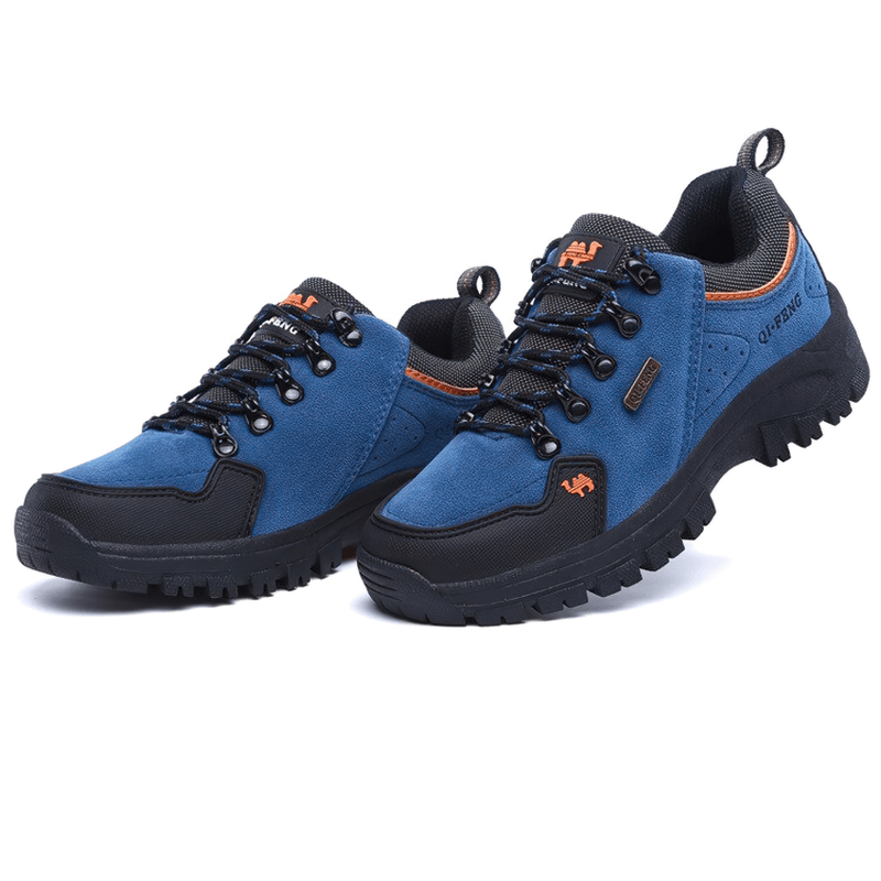 Blue non-slip waterproof hiking shoes with breathable upper and rubber outsole, ideal for outdoor trekking and performance.