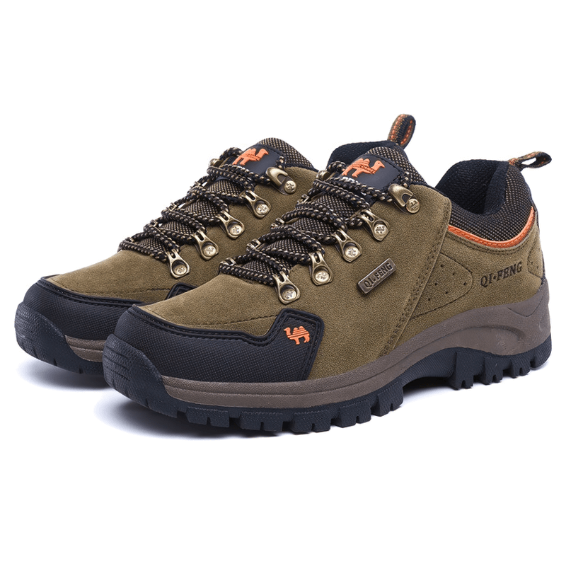 Athletic non-slip waterproof hiking shoes, green leather with a durable rubber sole, perfect for trekking and outdoor adventures.