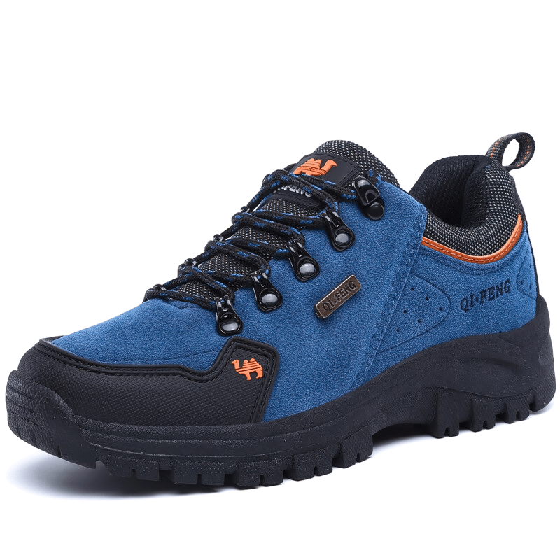 Athletic non-slip blue hiking boots with waterproof leather upper and sturdy rubber soles, designed for outdoor performance and comfort.