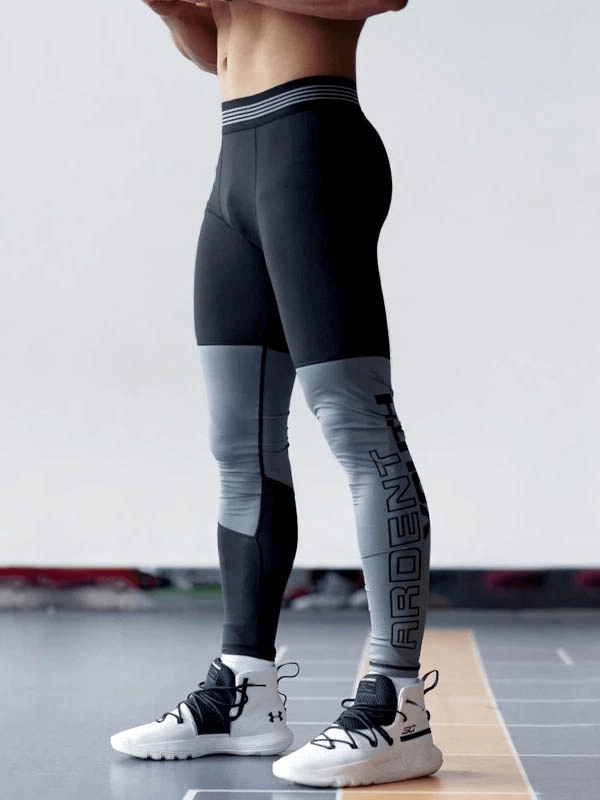 Athletic quick-drying compression tights, stylish gray/black design, perfect for sports like running, fitness, and bodybuilding.