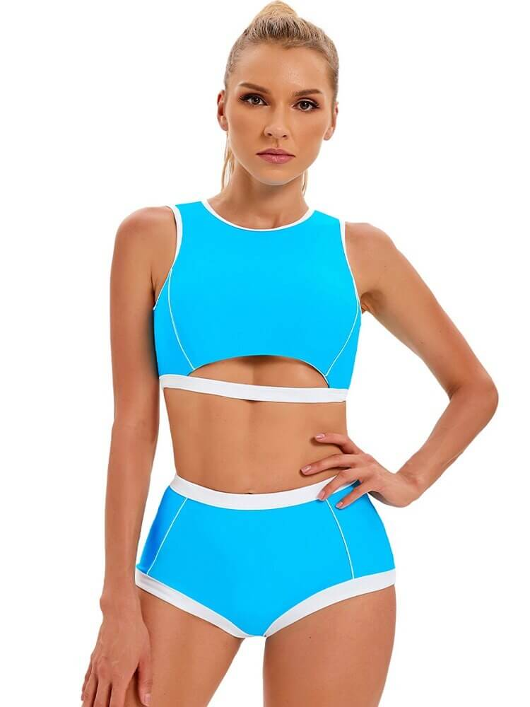 Woman wearing blue athletic split swimsuit with hollowed-out back, ideal for swimming and sports. Ladies' two-piece swimwear.