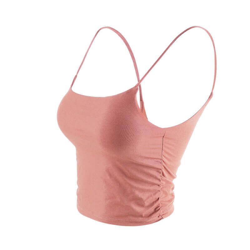 Athletic women's strap thin camis in pink, designed for yoga, made from anti-friction nylon for comfort and freedom of movement.
