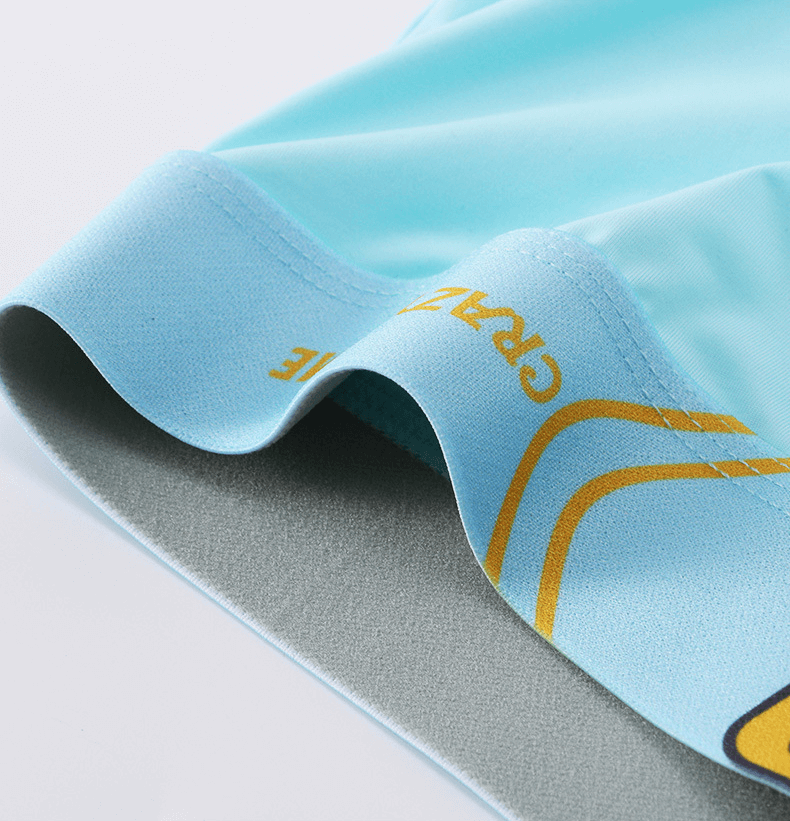 Light blue breathable cotton men's boxer shorts close-up, showcasing soft fabric and stylish design for ultimate comfort and style.