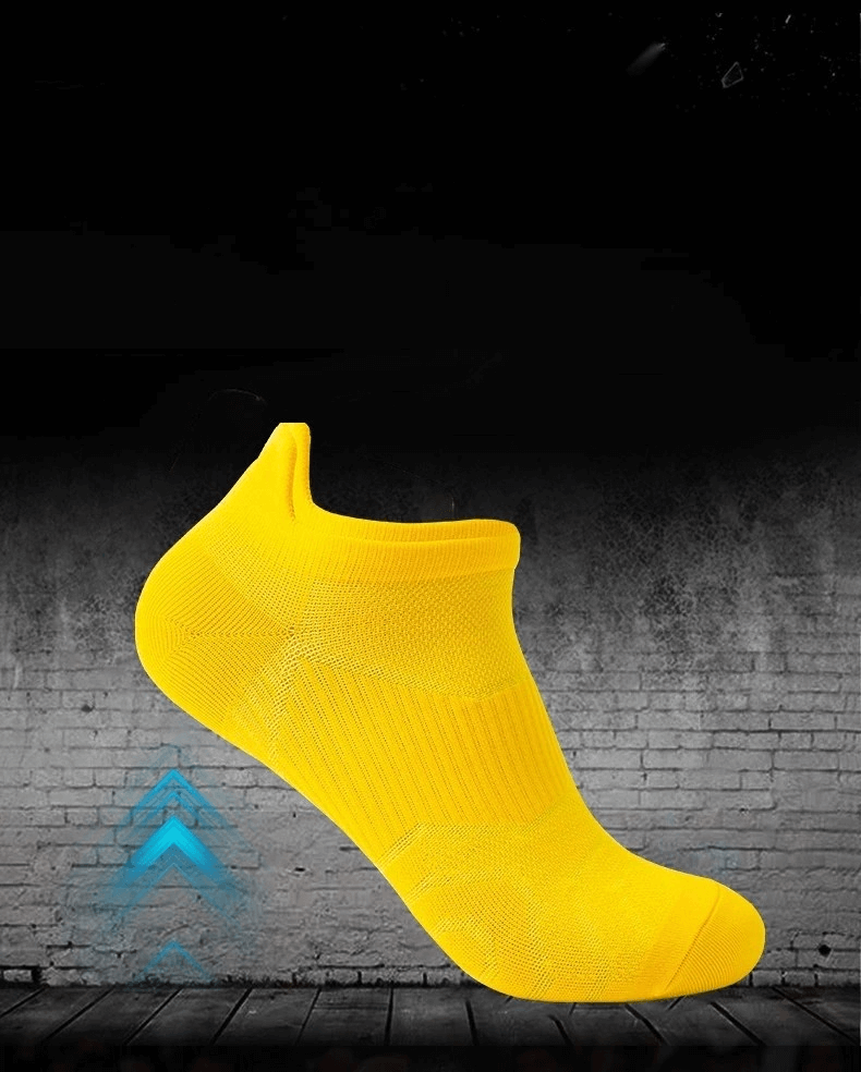 Bright yellow breathable anti-slip sports sock, unisex design with lightweight, sweat-absorbing nylon material for active wear.