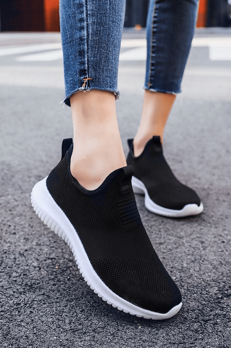 Breathable flexible elastic casual sneakers SF0745 with black mesh upper, white sole, perfect for men and women on the go.