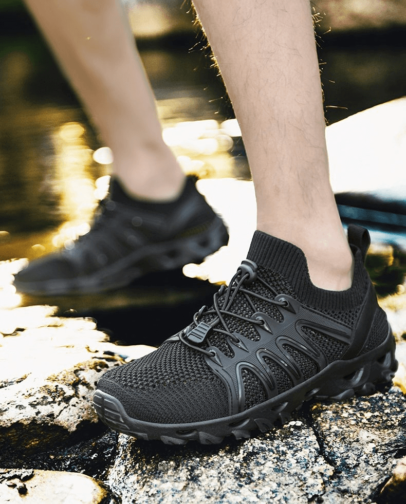 Breathable Flexible Sports Men's Trekking Sneakers SF0815 for outdoor adventures, showcasing black mesh design and cushioned EVA outsole.