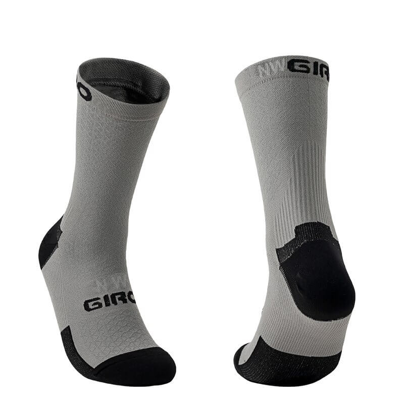 Gray breathable knee-high cycling socks for men and women made from nylon and Lycra, offering comfort and non-slip fit.