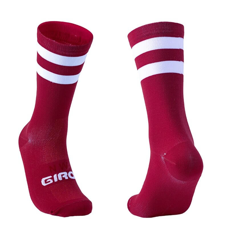Red breathable knee-high cycling socks for men and women, featuring stylish white stripes and snug fit for optimal comfort on rides.