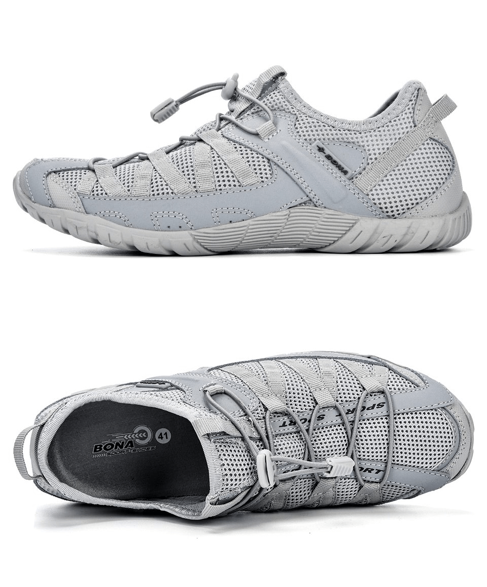 Lightweight breathable mesh sneakers for men in gray, featuring rubber outsole and elastic band closure. Perfect for sports and adventures.