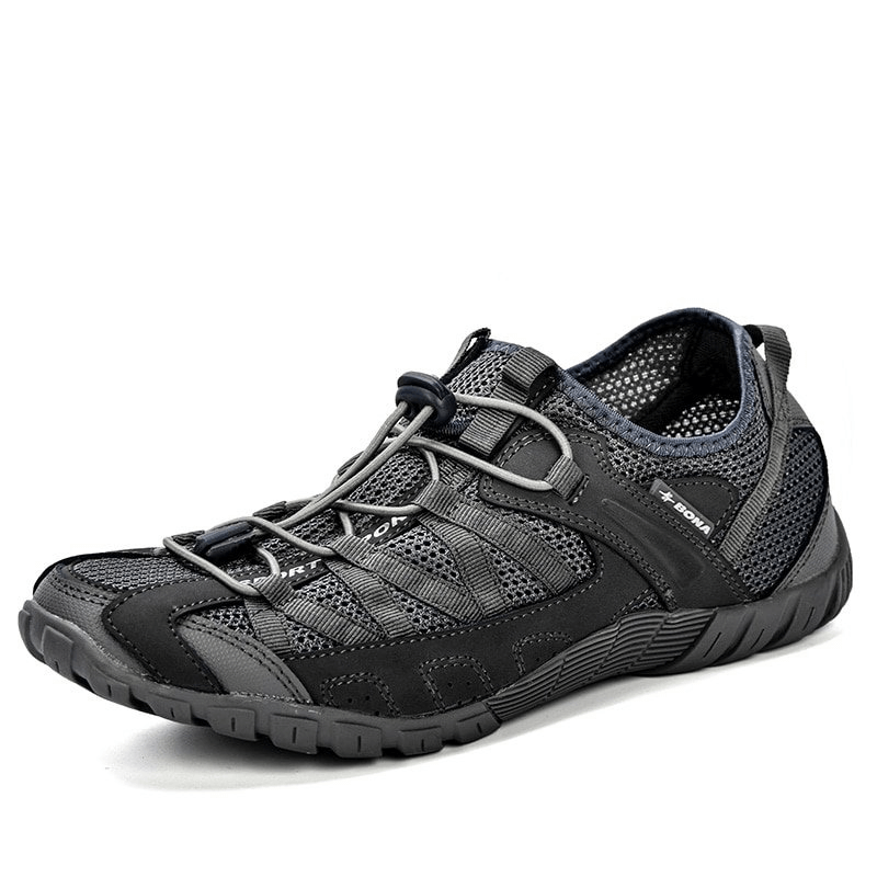 Breathable mesh flexible black sneakers for men, lightweight sports footwear model SF0758 with rubber outsole and elastic band closure.