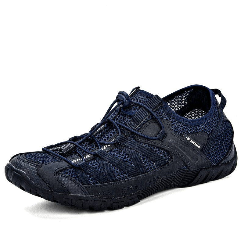Navy blue breathable mesh flexible sneakers for men with an elastic band closure and rubber outsole, perfect for lightweight sports activities.