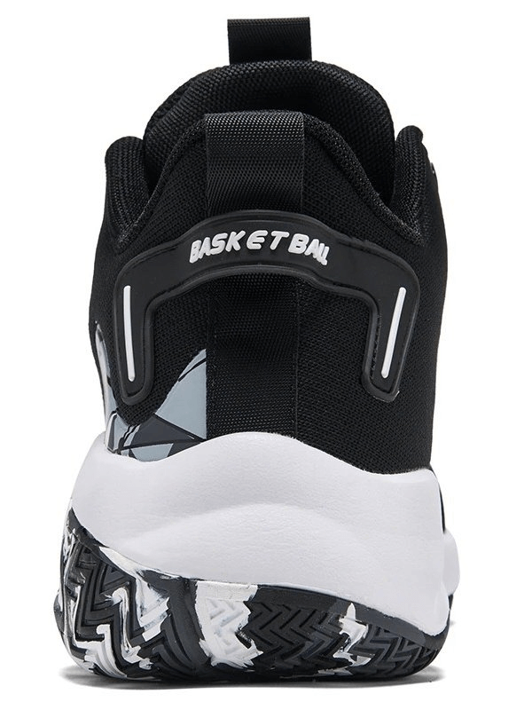 Rear view of breathable mesh sports shoe SF0706 with black and white design, showcasing cushioned heel and traction outsole.