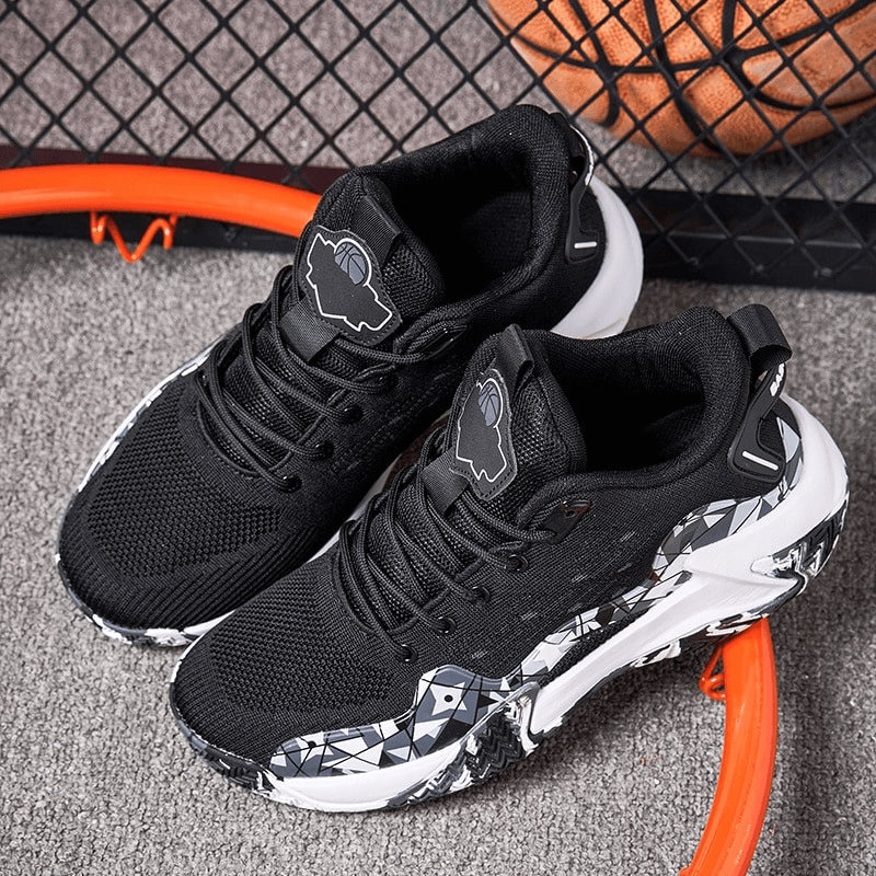 Breathable Mesh Sports Shoes with Cushioning SF0706 resting on a basketball court with a hoop in the background.