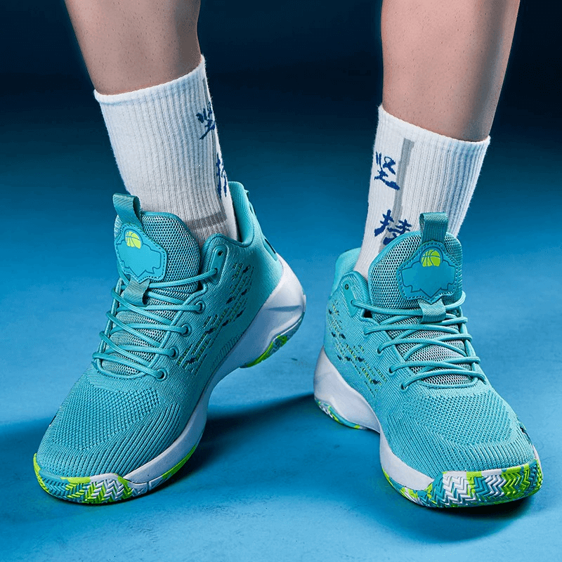 Turquoise breathable mesh sports shoes with cushioning and rubber outsole, perfect for optimal performance and traction.