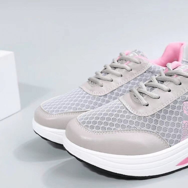 Breathable mesh thick-bottom sneakers with light lace-up design, grey with pink accents, perfect for casual wear. Model SF0262.