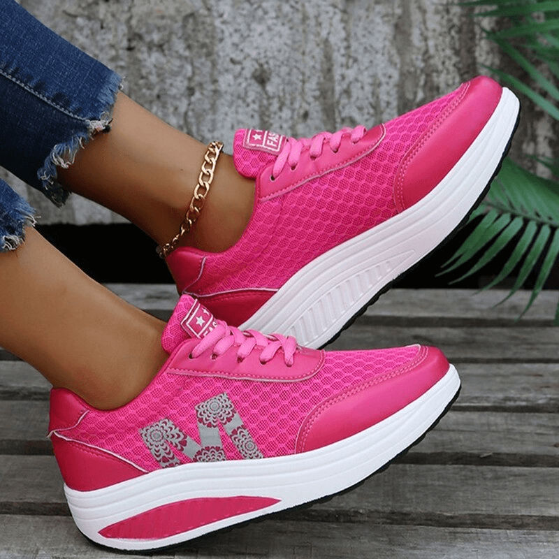 Bright pink breathable mesh thick-bottom sneakers with lace-up design, perfect for casual wear and comfort, featuring a stylish look.
