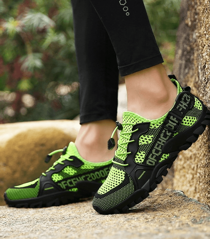 Unisex Breathable Mesh Trekking Shoes SF0756 in vibrant green with rubber outsole, perfect for outdoor adventures.