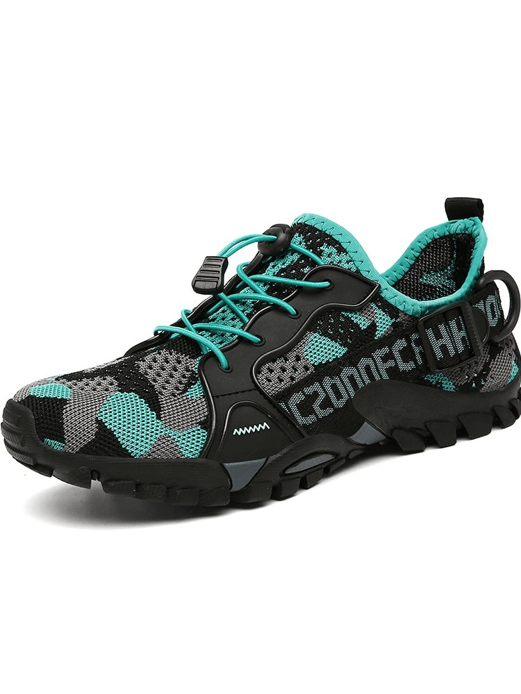 Black and teal breathable mesh trekking shoes SF0756, unisex sports sneakers with rubber outsole and elastic band closure for outdoor adventures.
