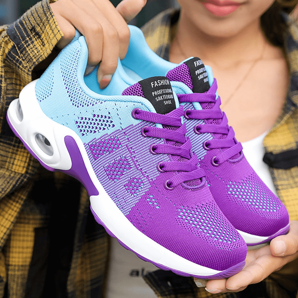 Vibrant purple and blue lace-up cushioned running shoes with breathable mesh and wear-resistant outsole.