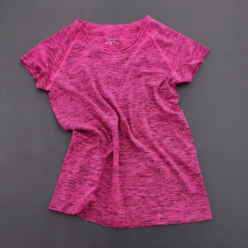 Vibrant pink breathable women's short sleeve quick-dry t-shirt, ideal for yoga, jogging, and running with anti-shrink technology.
