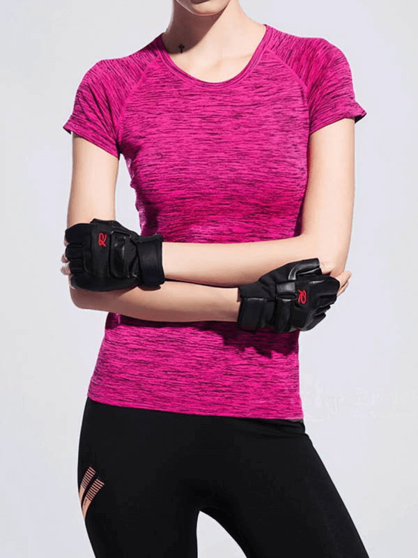 Woman wearing breathable pink short-sleeve t-shirt, ideal for sports and fitness activities.