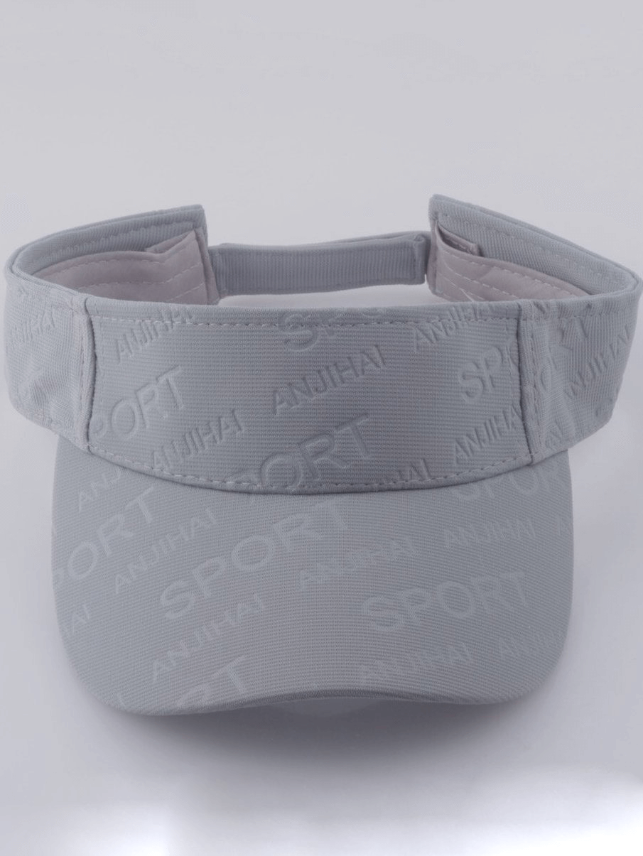 Stylish grey sports visor with letter pattern, designed for sun protection. Unisex apparel for active men and women.