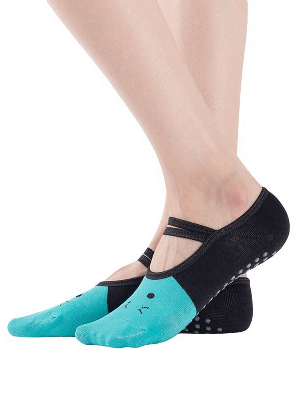 Cartoon cat print anti-slip yoga socks for women, turquoise and black, with superior grip and comfort, perfect for Pilates and yoga.
