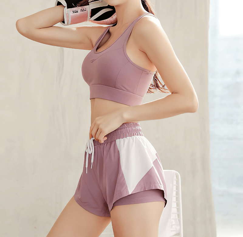 Casual breathable elastic waist sports shorts in purple, featuring a patchwork design for activewear comfort and style.