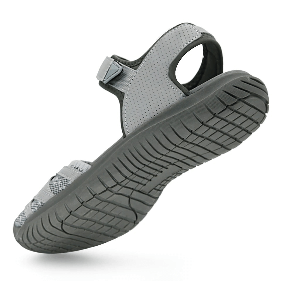 Gray women's casual closed toe flat trekking sandal with EVA insole and hook loop closure, perfect for travel and comfort.