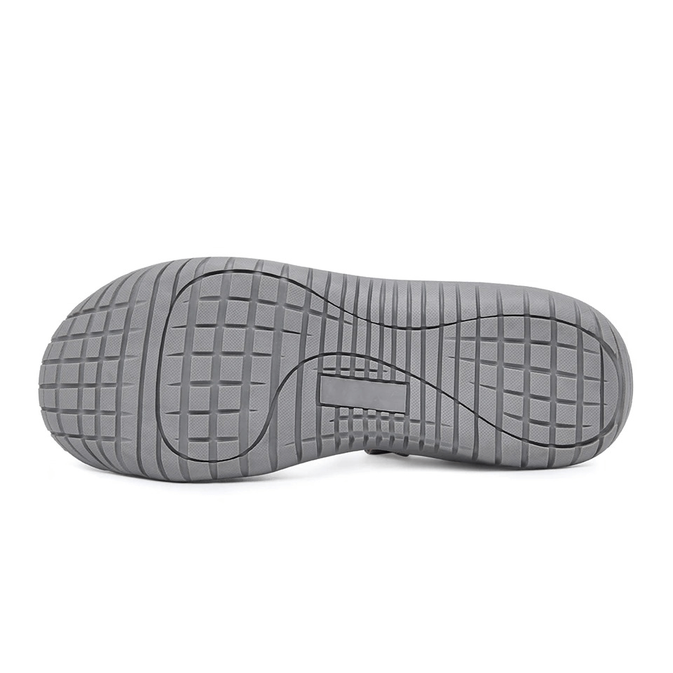 Grey sole of Women's Trekking Shoe SF0269 showcasing durable grip pattern for comfortable walking.