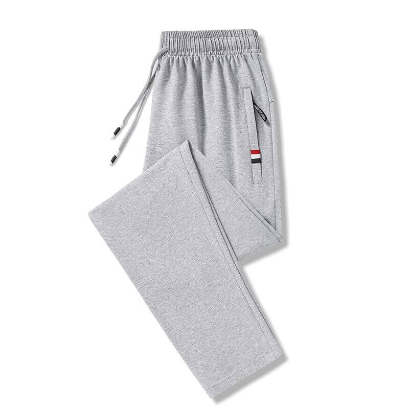 Gray cotton elastic waist sweatpants with pockets for men, featuring drawstring and fleece lining for warmth.