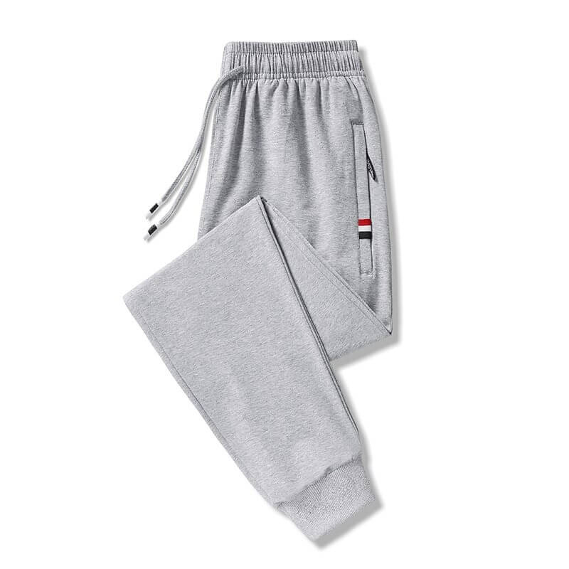 Casual cotton sweatpants for men with elastic waist, drawstring, and pockets. Ideal for daily wear. Warm fleece material.