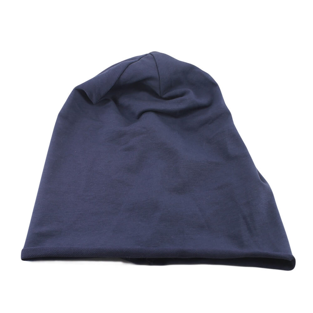 Casual cotton soft solid beanie in navy blue for unisex, perfect for adding style and warmth with its durable knitted construction.