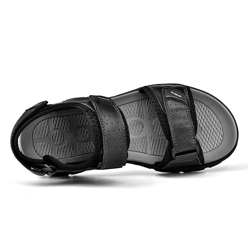 Casual genuine leather sandal in black with soft soles, ideal for hiking and trekking. Features durable EVA outsole and cotton lining.