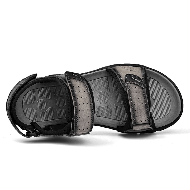 Top view of casual genuine leather hiking sandal with soft sole and mixed colors, perfect for outdoor activities.