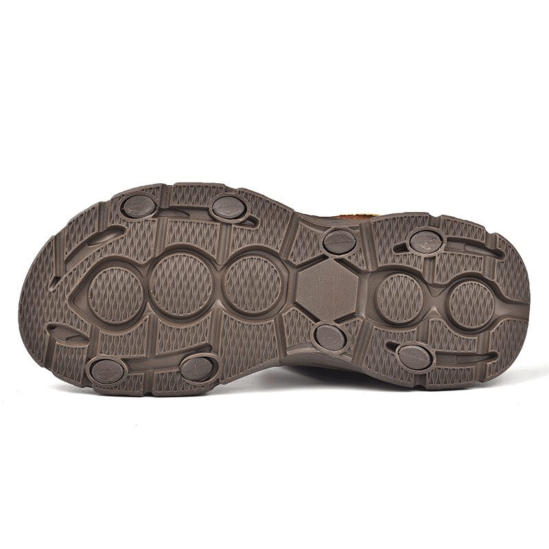 Brown EVA outsole of casual leather sandals, showing intricate grip pattern for hiking and trekking. Product code: SF0777.
