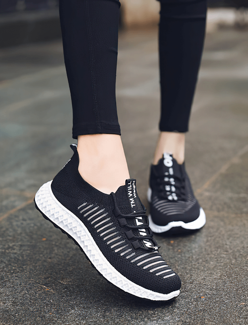 Casual lace-up flat bottom women's sneakers with breathable mesh design, perfect for everyday comfort and style.