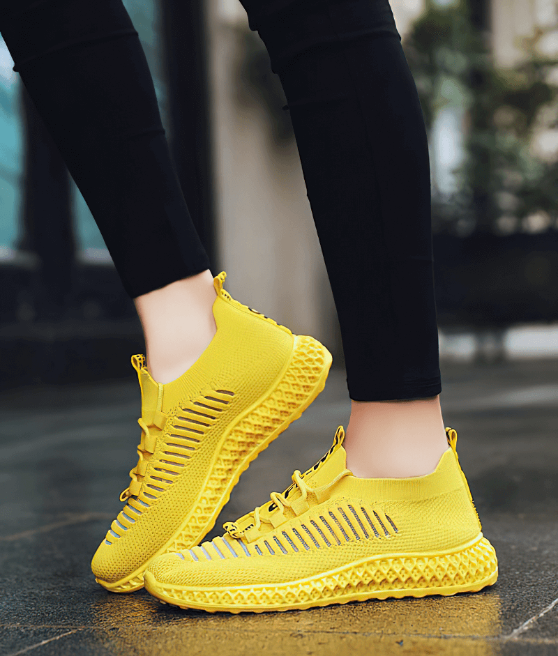 Yellow mesh breathable sneakers with a lace-up design, perfect for casual wear and activities. Stylish flat-bottom shoes for women.